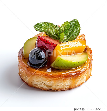 Fresh Fruit Tart with Colorful Fruits and Mint Garnish on White Background Fresh Fruit Tart with Colorful Fruits and Mint Garnish on White Background 136932290