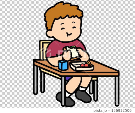 午餐時間:一個棕髮男孩在辦公桌前吃三明治。 午餐時間:一個棕髮男孩在辦公桌前吃三明治。 136932506