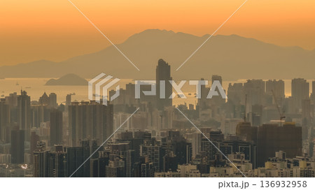 Jan 11 2026 Mong Kok cityscape with dense buildings under sunset glow Jan 11 2026 Mong Kok cityscape with dense buildings under sunset glow 136932958