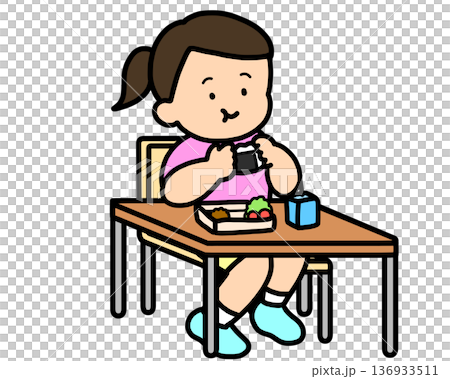 Lunchtime: Asian girl eating rice balls at her desk Lunchtime: Asian girl eating rice balls at her desk 136933511
