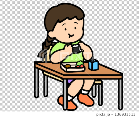 Lunchtime: Asian girl eating rice balls at her desk 136933513