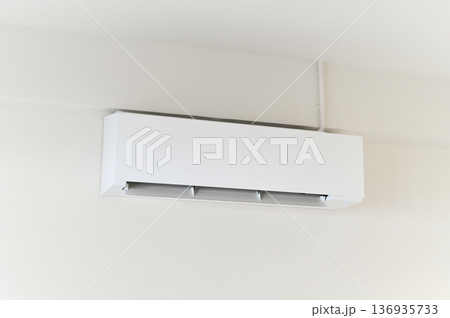 Wall air conditioner white modern appliance cooling interior home technology Wall air conditioner white modern appliance cooling interior home technology mounted wall bright room energy efficient 136935733