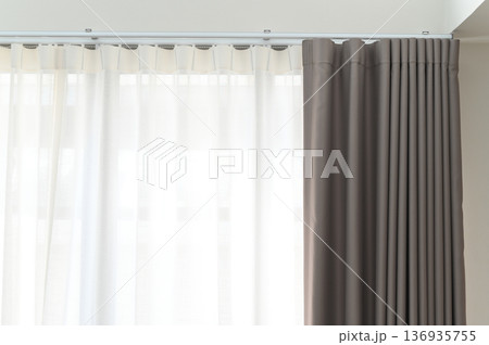 White sheer curtain gray blackout curtain window modern interior sunlight fabric home living room privacy minimalist style create calm and cozy atmosphere in contemporary space 136935755