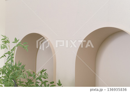 Minimalist arch beige wall interior design modern architecture decorative plant soft light contemporary style home decor empty space neutral color Minimalist arch and beige wall interior design 136935836