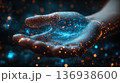 Futuristic hand holding digital glowing particles 136938600