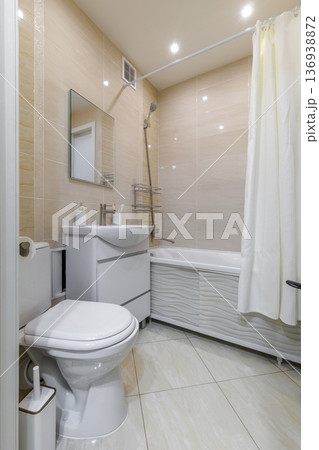 Modern Neutral Bathroom Interior with Bathtub and Vanity Modern Neutral Bathroom Interior with Bathtub and Vanity 136938872