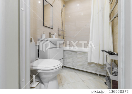 Full View of Modern Neutral Bathroom with Toilet and Bath Full View of Modern Neutral Bathroom with Toilet and Bath 136938875