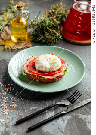 Bagel toast breakfast with poached egg 136939943