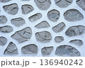 Stone wall texture background with natural masonry pattern and rough surface 136940242