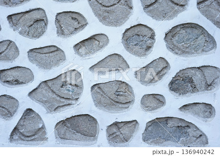 Stone wall texture background with natural masonry pattern and rough surface Stone wall texture background with natural masonry pattern and rough surface 136940242