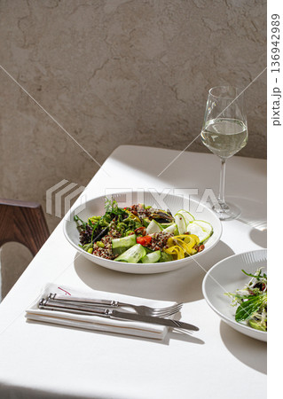 Vegetable quinoa bowl with white wine Vegetable quinoa bowl with white wine 136942989
