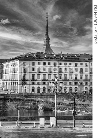 Mole Antonelliana towering over Turin, Italy, on a sunny day 136944763