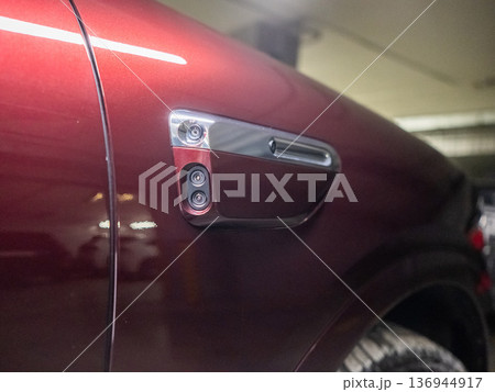 Cameras on the body of a red car. Cameras on the body of a red car. 136944917