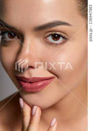 Beautiful Happy Smiling Young Woman With Fresh Natural Facial Makeup On Beauty Face. Portrait of beauty model with natural nude make up. Spa, skincare, wellness. Close up. Beautiful Happy Smiling Young Woman With Fresh Natural Facial Makeup On Beauty Face. Portrait of beauty model with natural nude make up. Spa, skincare, wellness. Close up. 136947865