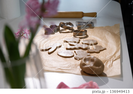 Preparing Festive Easter Bunny and Gingerbread Cookies for a Sweet Spring Celebration Preparing Festive Easter Bunny and Gingerbread Cookies for a Sweet Spring Celebration 136949413