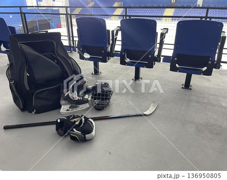 hockey guard and skates in ice stadium 136950805