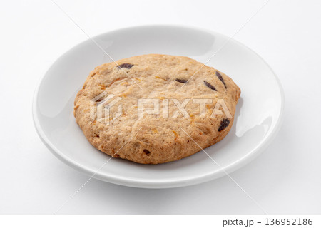 One freshly baked pumpkin cookie. 136952186