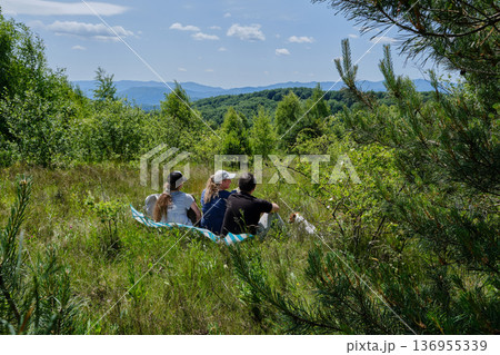 Family Picnic with Dog on Mountain View Family Picnic with Dog on Mountain View 136955339