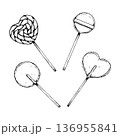 Black and white line art illustration set of lollipops in round, swirl and heart shapes. Hand drawn candy collection in ink style for Valentine promotions, packaging design and confectionery branding. 136955841