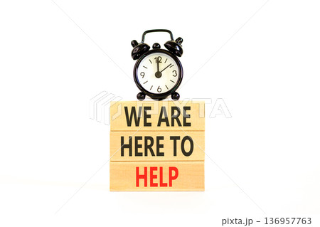 Support, help and we are here to help symbol. Concept words We are here to help on beautiful wooden blocks. Beautiful white background. Alarm clock. Business we are here to help concept. Copy space. Support, help and we are here to help symbol. Concept words We are here to help on beautiful wooden blocks. Beautiful white background. Alarm clock. Business we are here to help concept. Copy space. 136957763