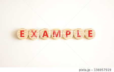 Example examples symbol. Concept word Example on beautiful wooden circles. Beautiful white background. Business example examples concept. Copy space. Example examples symbol. Concept word Example on beautiful wooden circles. Beautiful white background. Business example examples concept. Copy space. 136957919