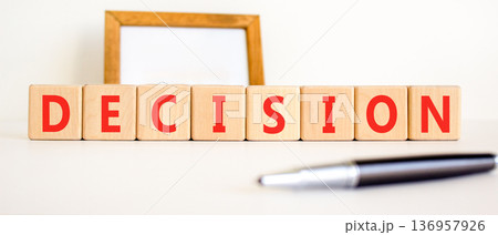 Decision word symbol. Concept word Decision on beautiful wooden blocks. Beautiful white background. Beautiful black pen. Business support help decision word concept. Copy space. Decision word symbol. Concept word Decision on beautiful wooden blocks. Beautiful white background. Beautiful black pen. Business support help decision word concept. Copy space. 136957926