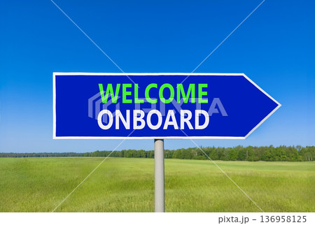 Welcome onboard symbol. Concept words Welcome onboard on beautiful blue road sign. Beautiful blue sky green grass field background. Business, motivational welcome onboard concept. Copy space. Welcome onboard symbol. Concept words Welcome onboard on beautiful blue road sign. Beautiful blue sky green grass field background. Business, motivational welcome onboard concept. Copy space. 136958125