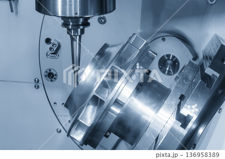 Simultaneous 5-axis CNC milling machine cutting a complex water turbine runner using a solid carbide ball nose end mill. Simultaneous 5-axis CNC milling machine cutting a complex water turbine runner using a solid carbide ball nose end mill. 136958389