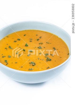 Creamy Carrot Soup in Blue Bowl 136958802