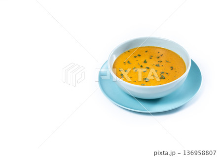 Creamy Carrot Soup in Blue Bowl Creamy Carrot Soup in Blue Bowl 136958807