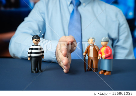An official protects elderly people from a fraudster. Safeguarding seniors from financial scams. Consumer protection and social security enforcement An official protects elderly people from a fraudster. Safeguarding seniors from financial scams. Consumer protection and social security enforcement 136961055
