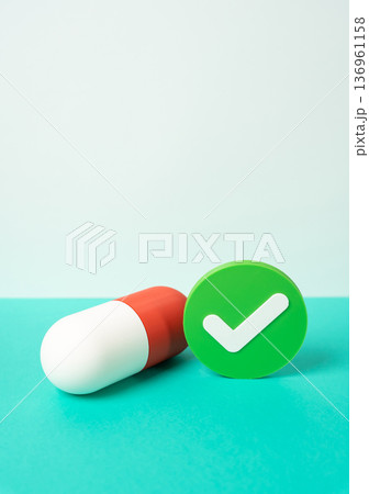 Medicinal capsule and green check mark of approval. Successful clinical trials and launch of drug production. Marketing authorization and pharmaceutical innovation concept for healthcare industry 136961158