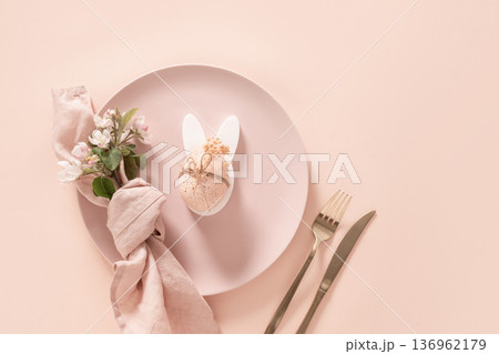 Easter table composition with egg decoration and spring flowers Easter table composition with egg decoration and spring flowers 136962179
