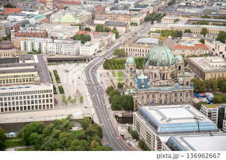 Berlin, germany, august 15, 2023. Berlin cityscape with berlin cathedral, museum island, and spree river under cloudy sky, showcasing historical and modern architecture 136962667