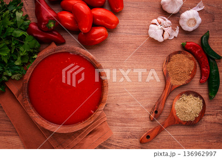 Georgian sauce, Satsebeli sauce, tomato and sweet pepper sauce, with spices, in a wooden bowl, homemade, no people, 136962997