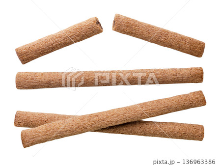 Set of chocolate wafer rolls on a white background. Top view 136963386