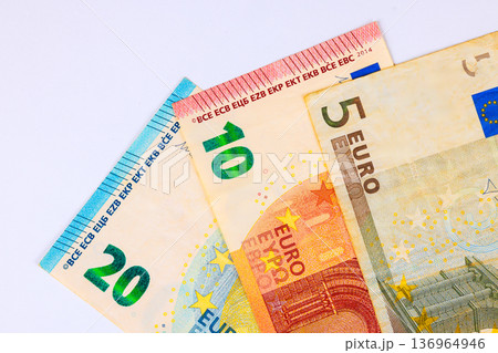 There are variety of euro cash banknotes, currency euro money bills used for business transactions. There are variety of euro cash banknotes, currency euro money bills used for business transactions. 136964946