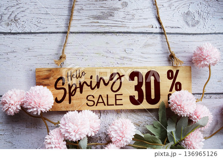 Spring Sale 30% off with flower bouquet decoration on wooden background Spring Sale 30% off with flower bouquet decoration on wooden background 136965126