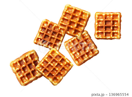 Multiple golden brown square waffles scattered randomly, isolated on white background. Concept of breakfast or snack food Multiple golden brown square waffles scattered randomly, isolated on white background. Concept of breakfast or snack food 136965554