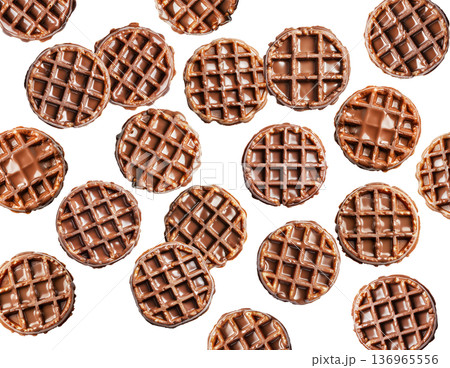 Multiple chocolate covered waffles arranged in a flat lay style isolated on white background, showing a sweet dessert food concept 136965556