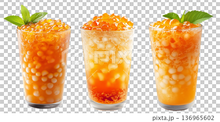 Orange bubble tea Filipino Sagot Gulaman filled with tapioca pearls and topped with mint, isolated on white background. Orange bubble tea Filipino Sagot Gulaman filled with tapioca pearls and topped with mint, isolated on white background. 136965602