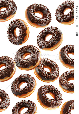 Multiple chocolate glazed donuts with chocolate sprinkles isolated on a white background, concept of sweet dessert snack Multiple chocolate glazed donuts with chocolate sprinkles isolated on a white background, concept of sweet dessert snack 136965631