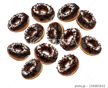Multiple chocolate glazed donuts with chocolate sprinkles isolated on a white background, concept of sweet dessert snack 136965632