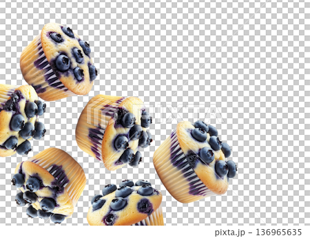 Multiple fresh blueberry muffins in scattered arrangement, isolated on white background. Concept of tasty homemade baking 136965635