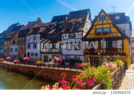 Embankment of Lauch River with historical houses in Colmar, France Embankment of Lauch River with historical houses in Colmar, France 136966876