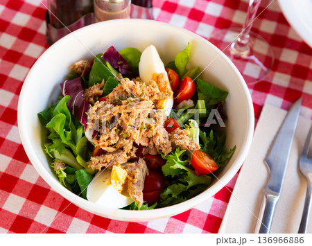 Salad with eggs, tuna and cherry tomatoes Salad with eggs, tuna and cherry tomatoes 136966886