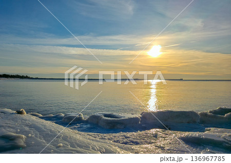 Winter Sunset Over Icy Baltic Sea Coastline in Liepaja Latvia 136967785