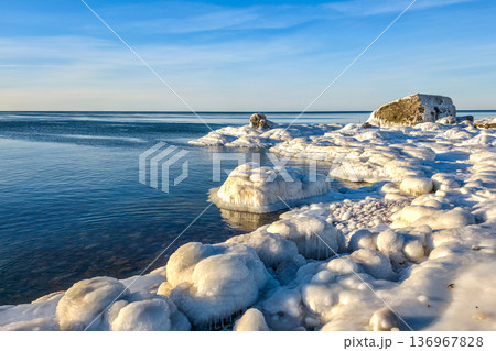 Winter Seascape with Icy Fortification Ruins on Baltic Sea Coast in Liepaja Latvia Winter Seascape with Icy Fortification Ruins on Baltic Sea Coast in Liepaja Latvia 136967828