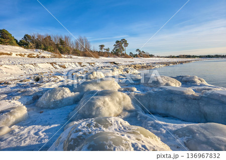 Frozen Baltic Sea Shoreline in Liepaja with Icy Winter Landscape 136967832