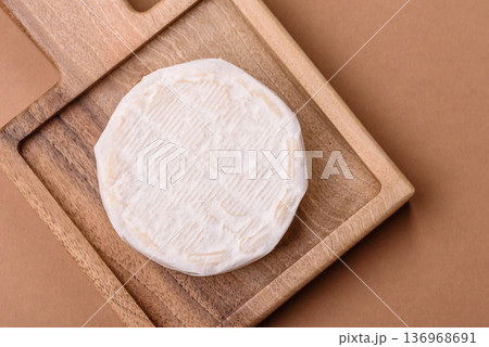 White French cream cheese Brie or Camembert for breakfast. Brie or Camembert cheese White French cream cheese Brie or Camembert for breakfast. Brie or Camembert cheese 136968691